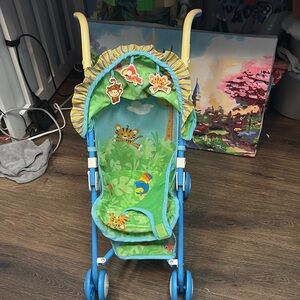 Fisher price doll stroller and high chair